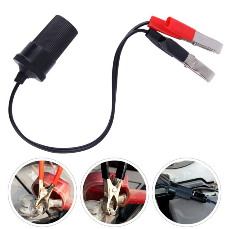Car battery jumper cable set with black nozzle, red-tipped clamps, and usage insets