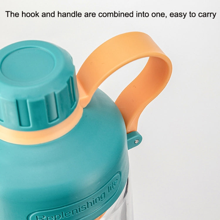 Teal plastic tea cup with orange integrated handle for easy carrying
