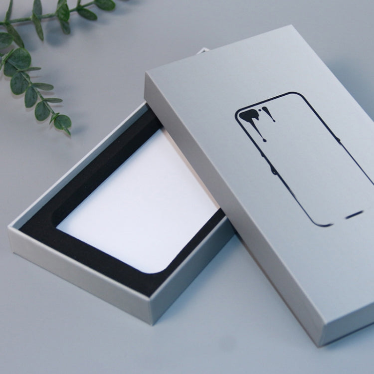 White phone case packaging box open with black insert tray