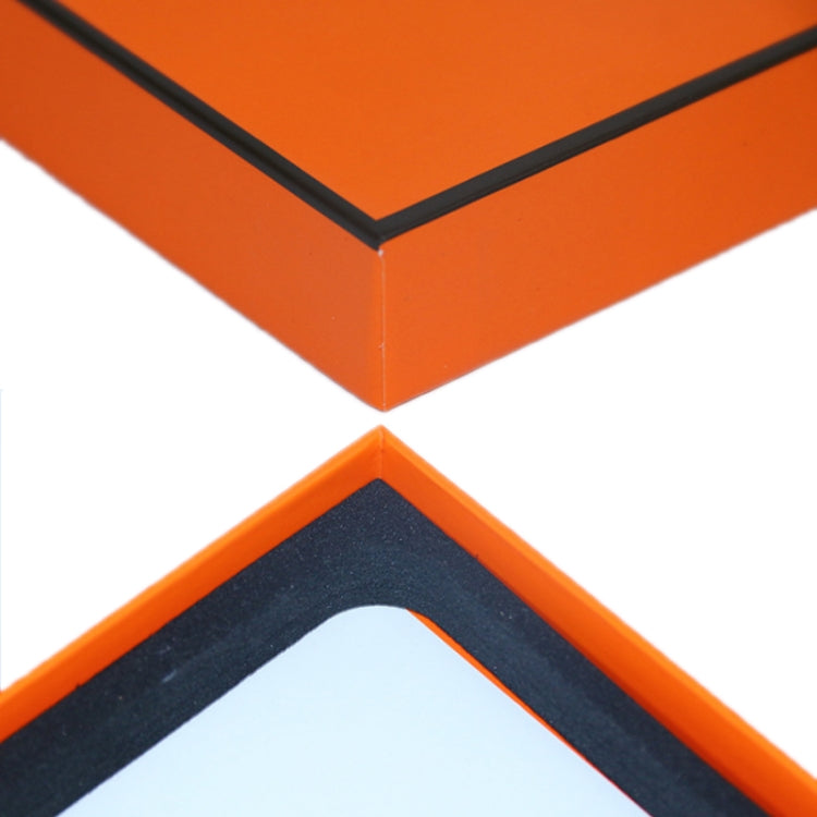 10-piece phone case and tempered film box set, close-up of black corner trim on orange box