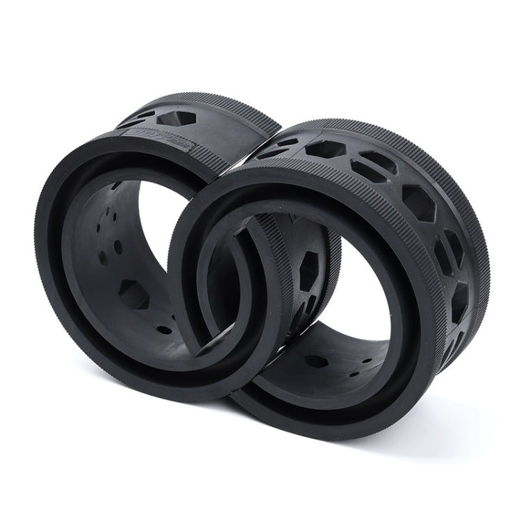 Black rubber spring buffer rings, two-piece set shown at an angle with side cutouts