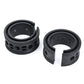 Two black rubber buffer rings separated, showing inner channel and side vent holes