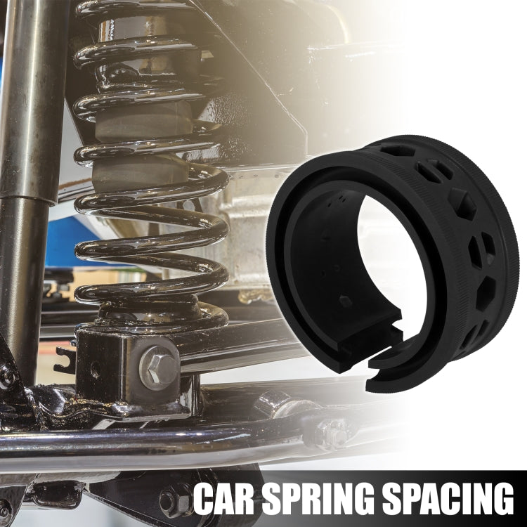 Black 19-hole spring spacer buffer ring for car suspension, close-up detail