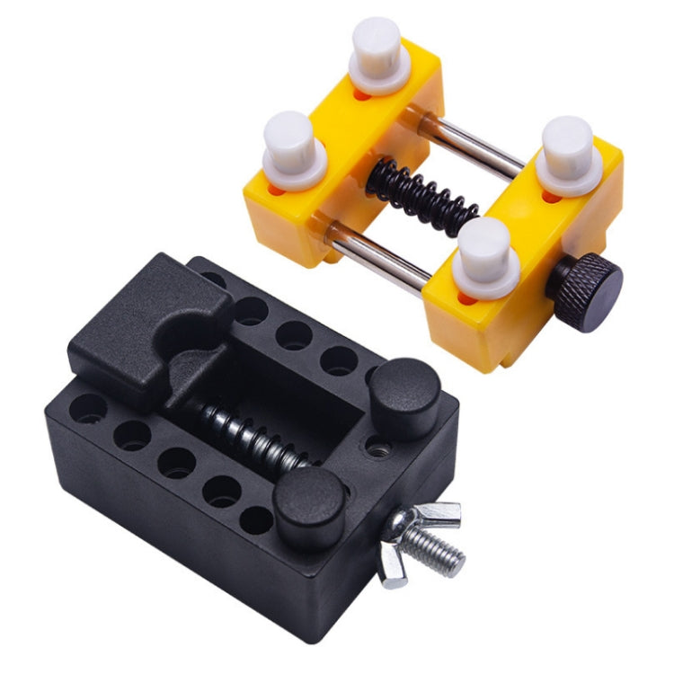 Watch repair clamp tools: black and yellow bases with spring and white posts