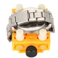 Yellow watch repair tool holding a metal watch case and movement section
