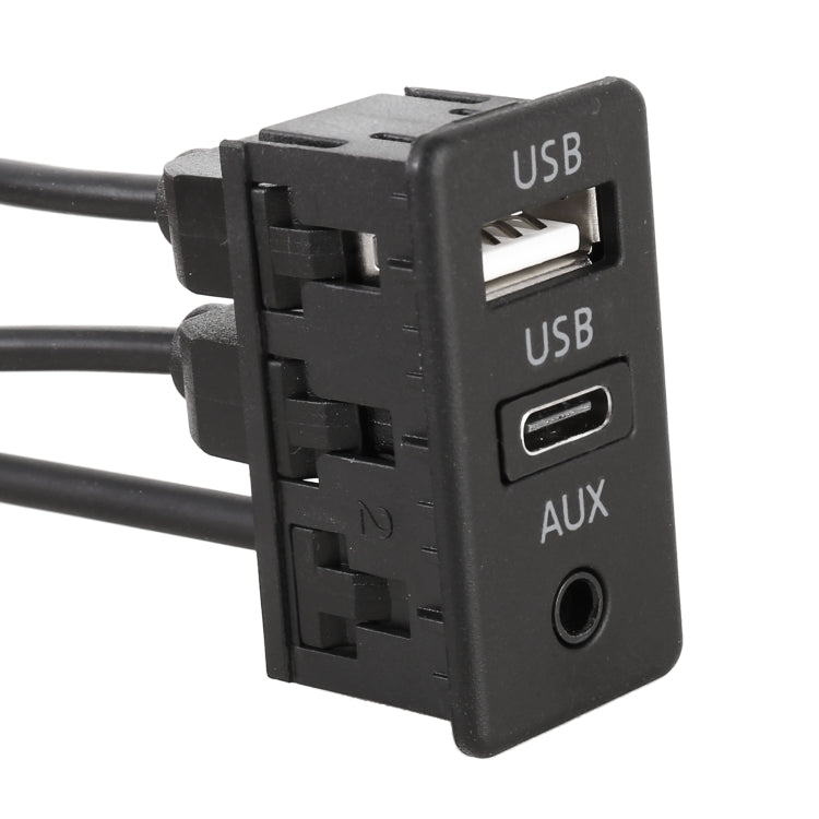 Car USB and AUX interface module with labeled USB, USB, and AUX ports
