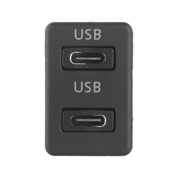 Black dual USB port adapter with two USB openings labeled USB