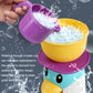 Baby penguin bath water toy with purple water wheel and yellow basin splashing water