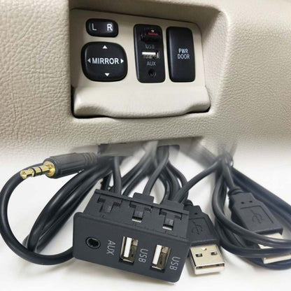 Car seat panel charging adapter with dual USB and AUX ports, mounted in console