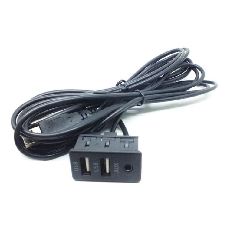 Dual USB and AUX charging adapter with attached black cable bundle