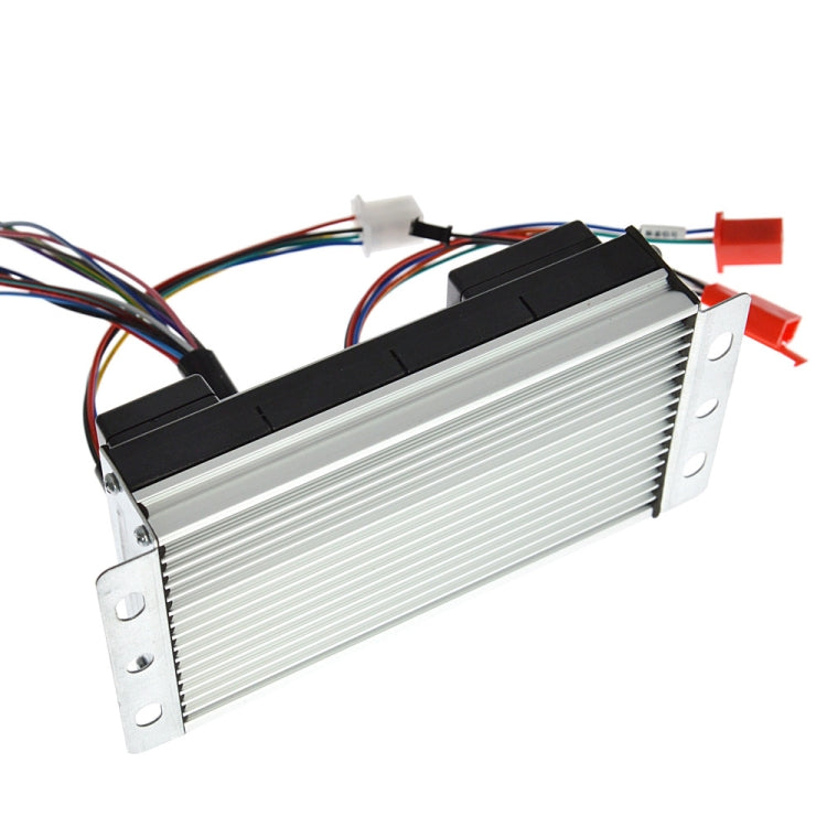 Electric motor speed controller with silver heat sink, black electronics, and wiring leads