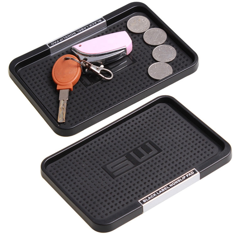 Black anti-slip car storage tray with raised edges and textured grip surface