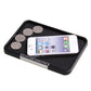 Black textured non-slip tray holding coins and a smartphone