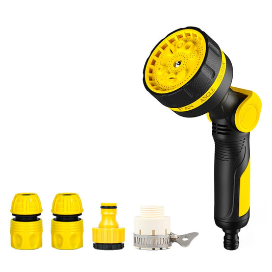 Garden sprinkler head with yellow dial, black handle, and connector pieces