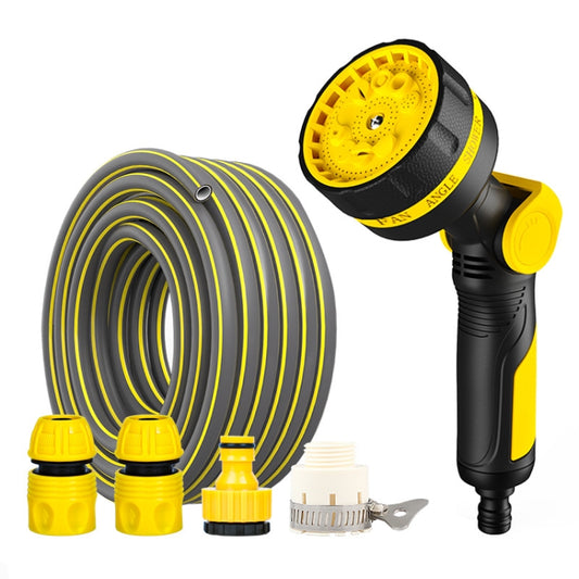 Yellow and black sprinkler head with long coiled gray tube and connectors