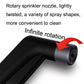 Rotary sprinkler nozzle head with red accent on black handle