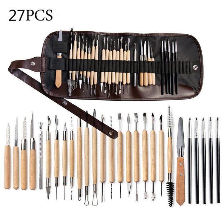 Pottery clay carving tool set in brown fabric roll with mixed metal tips and wood handles