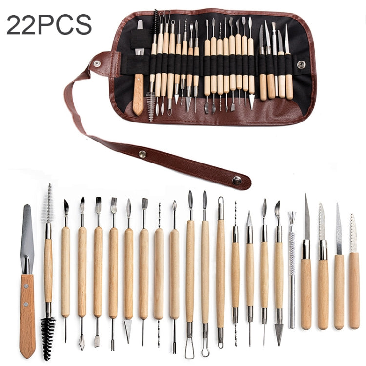 Pottery clay carving tool set with brown roll pouch and wood-handled metal tools