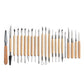 Pottery clay carving tool set with multiple metal tips and light wood handles