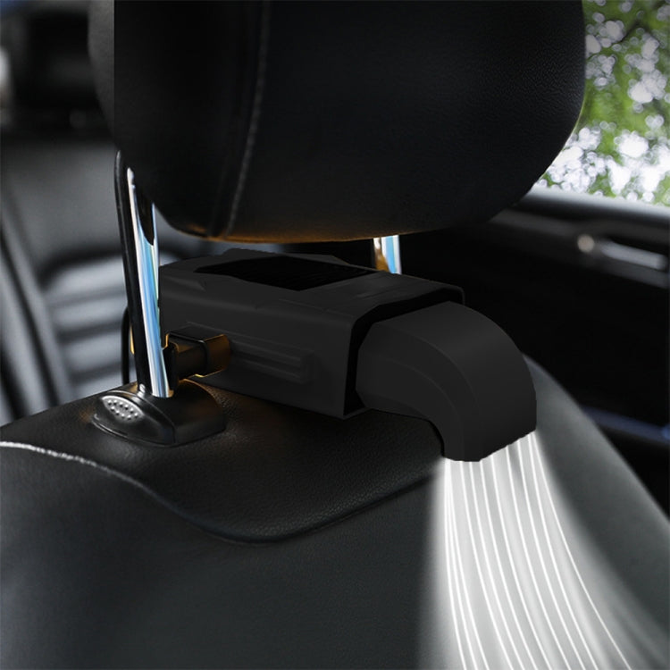 Yellow-topped car seat back fan mounted beside seat headrest, airflow vented