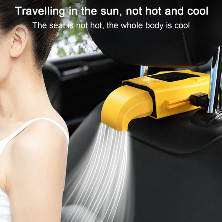 Yellow car seat back USB fan blowing air near passenger seat cushion