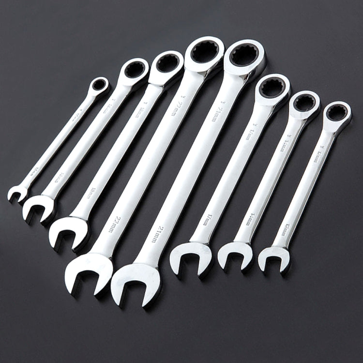 Set of chrome ratchet wrenches with offset open ends and socket drives