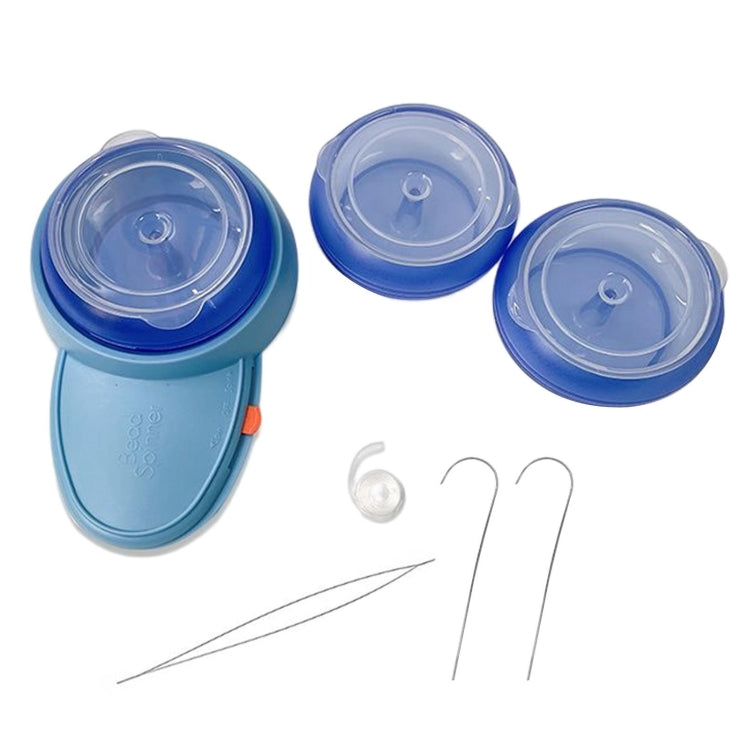 Blue electric beading machine base with three clear round lids and bead stringing needles