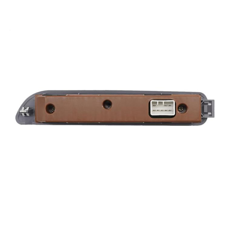 Window switch assembly back plate with connector port and mounting tabs, brown panel.
