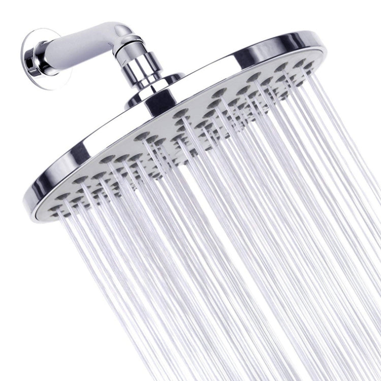 Chrome round shower head with multiple spray nozzles and white water lines