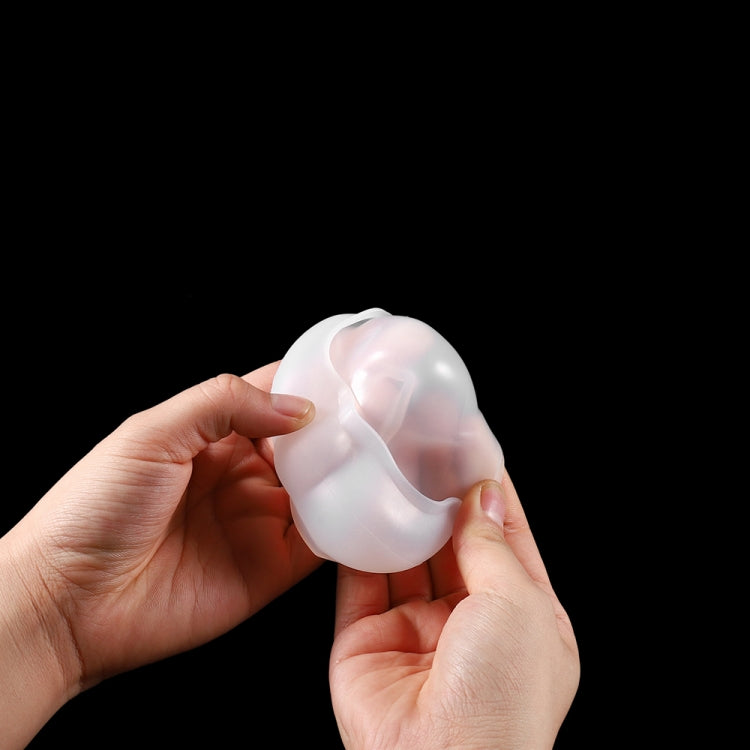 Cloud-shaped translucent silicone mold held in hands