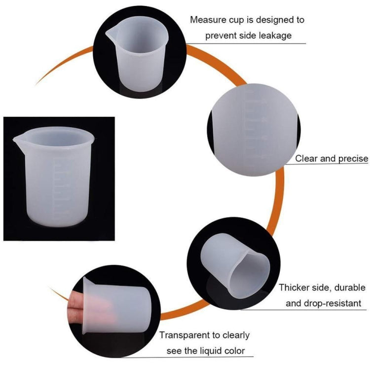 Translucent 100ml measuring cup with thick sidewall and graduated markings, angled close-up