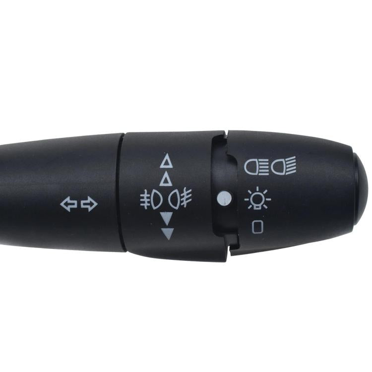 Black indicator switch stalk close-up showing control icons and arrow markings