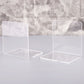 Two clear acrylic L-shaped bookends showing open front and flat bases