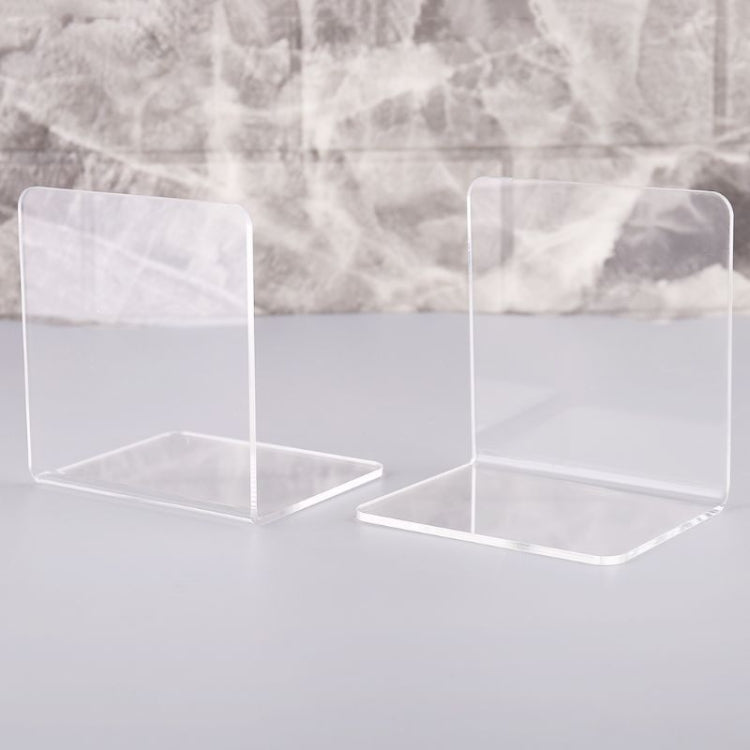 Two clear acrylic L-shaped bookends showing open front and flat bases