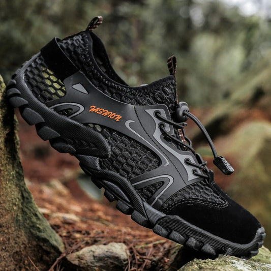 Black water hiking sandal shoe, side view, lace-up closure and textured outsole.