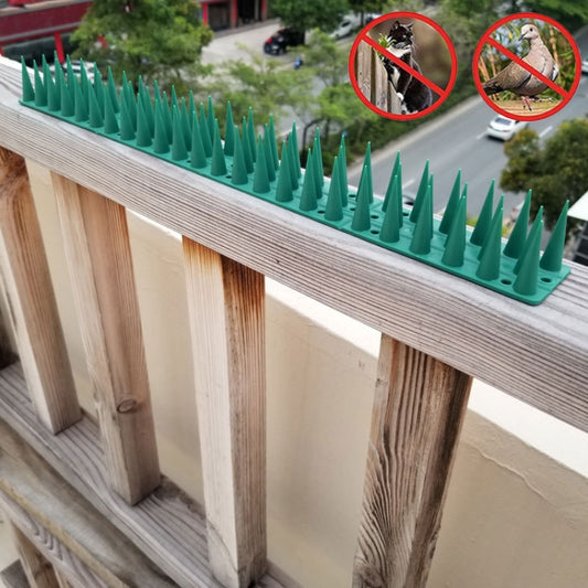 Plastic anti-climb fence spikes, green upright needle points