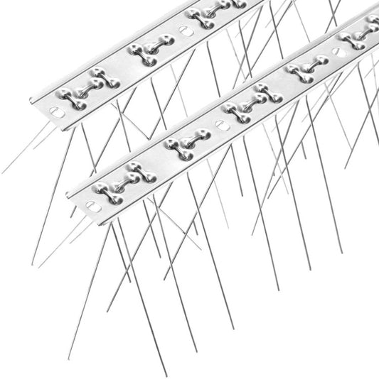 Close-up stainless steel bird spikes on a flat metal base strip with curved ends