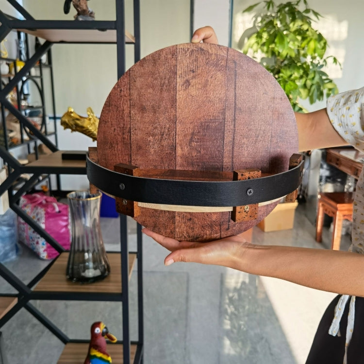 Wall-mounted wooden wine rack with black strap, round barrel back with bottle holders.