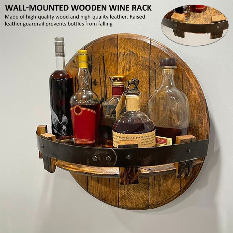 Round wooden wall-mounted wine rack with black leather strap and bottle compartments.