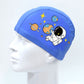 Blue kids waterproof swim cap on mannequin head with astronaut and planet cartoon