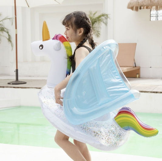 Inflatable kids unicorn swimming ring with blue sunshade, rainbow tail and glitter base