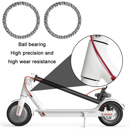 Electric scooter bearing kit with two metal ball-race rings on scooter frame