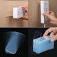Clear tape sticker applied to wall outlet, with additional sheet pieces
