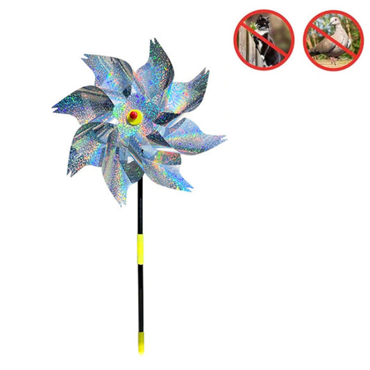 Reflective windmill bird deterrent pinwheel with blue-silver blades and yellow hub, on stake