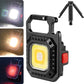 Black mini keychain flashlight with bracket, COB lamp and folding tripod legs