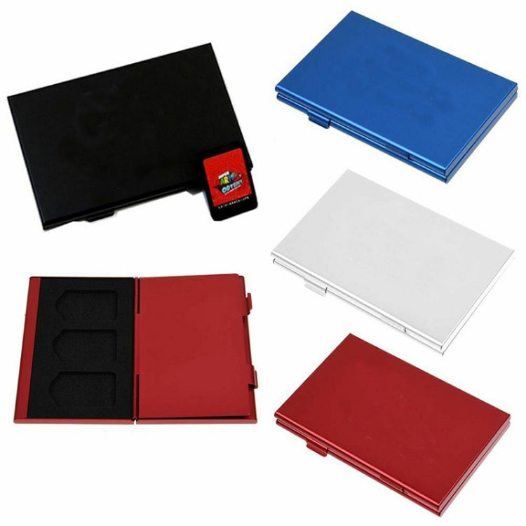 Set of aluminum game card storage cases in black, red, blue, and silver with inserts