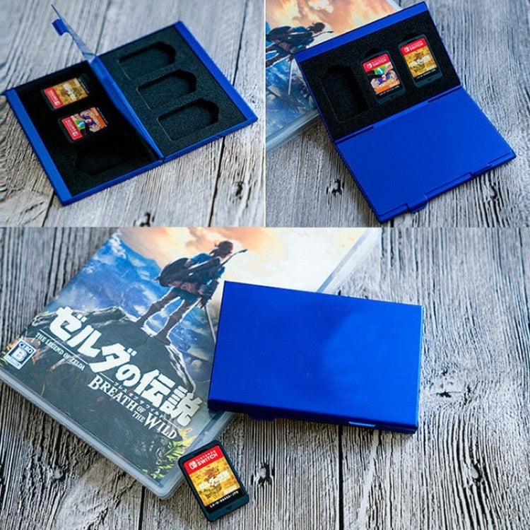 Blue aluminum game card storage case with black insert holding multiple game cards