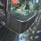 Close-up installed black carbon-fiber look engine under-mount stickers with five pieces