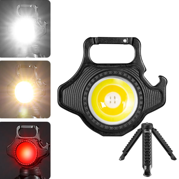 Black mini keychain flashlight with yellow LED and fold-out tripod stand.