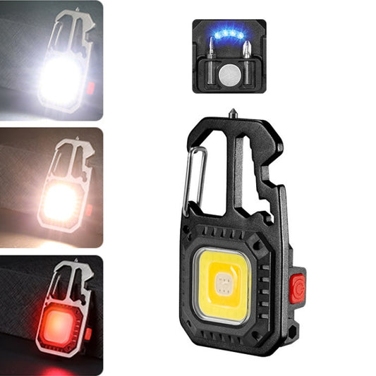 Portable LED flashlight showing red LED glow, dark housing and side red switch